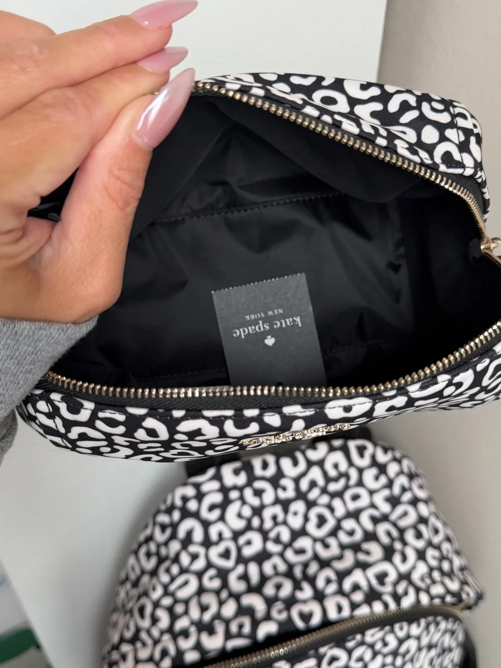 kate spade Black and White Leopard-Print Mini Backpack with cosmetics bag